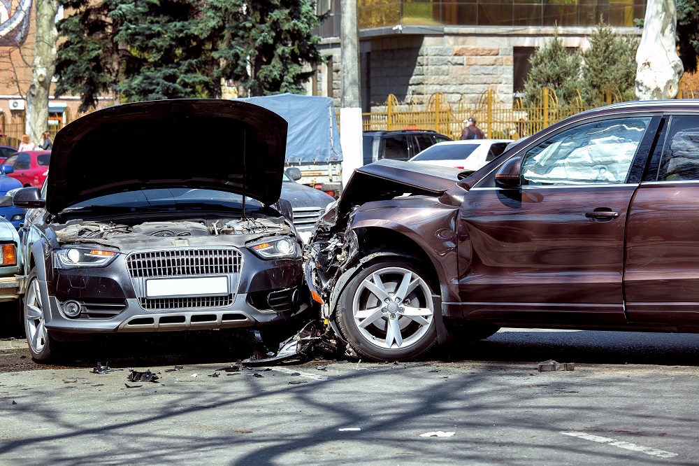 two cars damaged from an auto accident